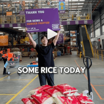 Gunwoo donating rice to Foodbank NSW & ACT