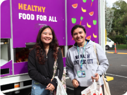 Monash University student at a Foodbank Farms to Families market