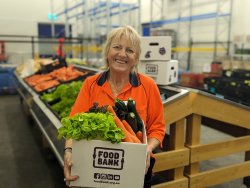 Teresa with Fresh Produce New Produce Stands Chiller Foodbank Perth